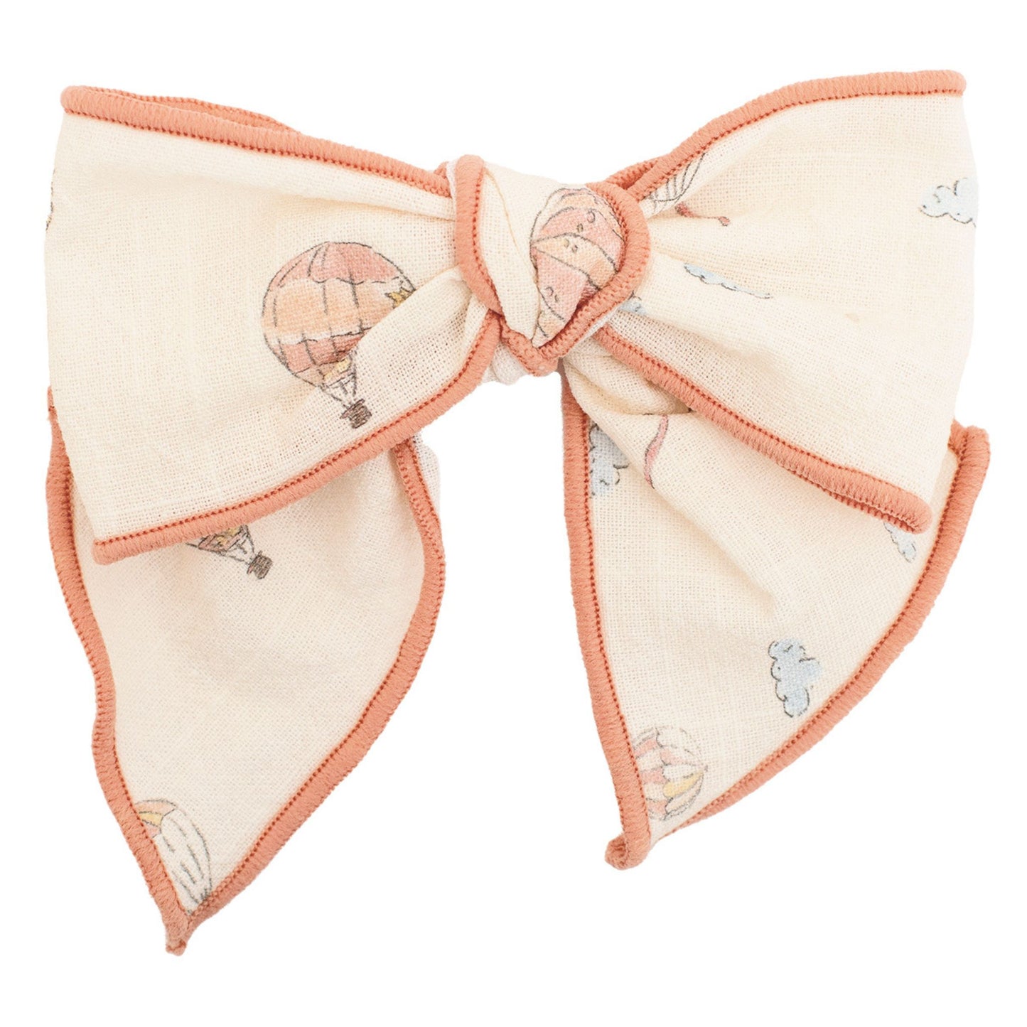 bow hairclip with hot air balloon design on a white background