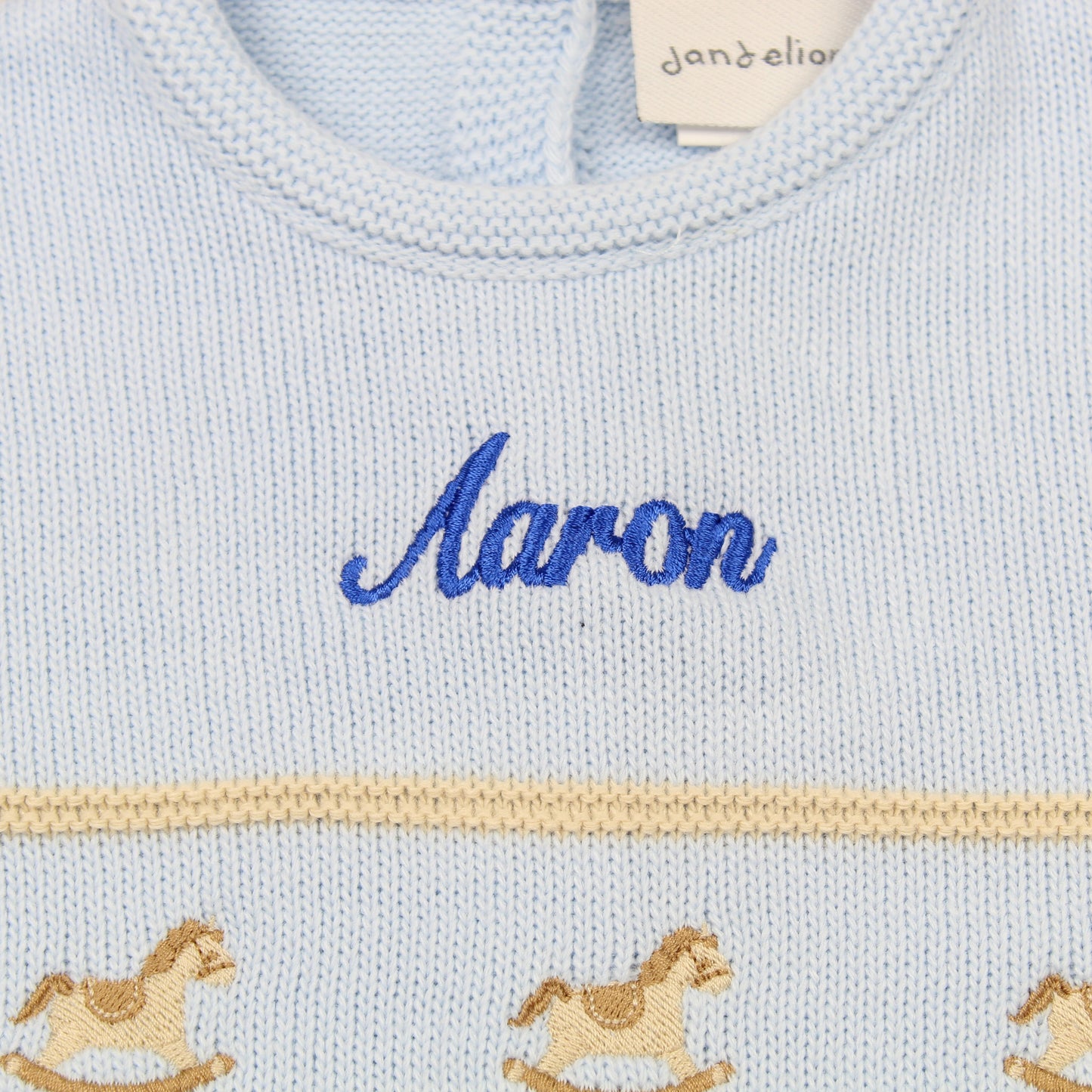 baby boys knitted all in one personalised outfit rocking horse