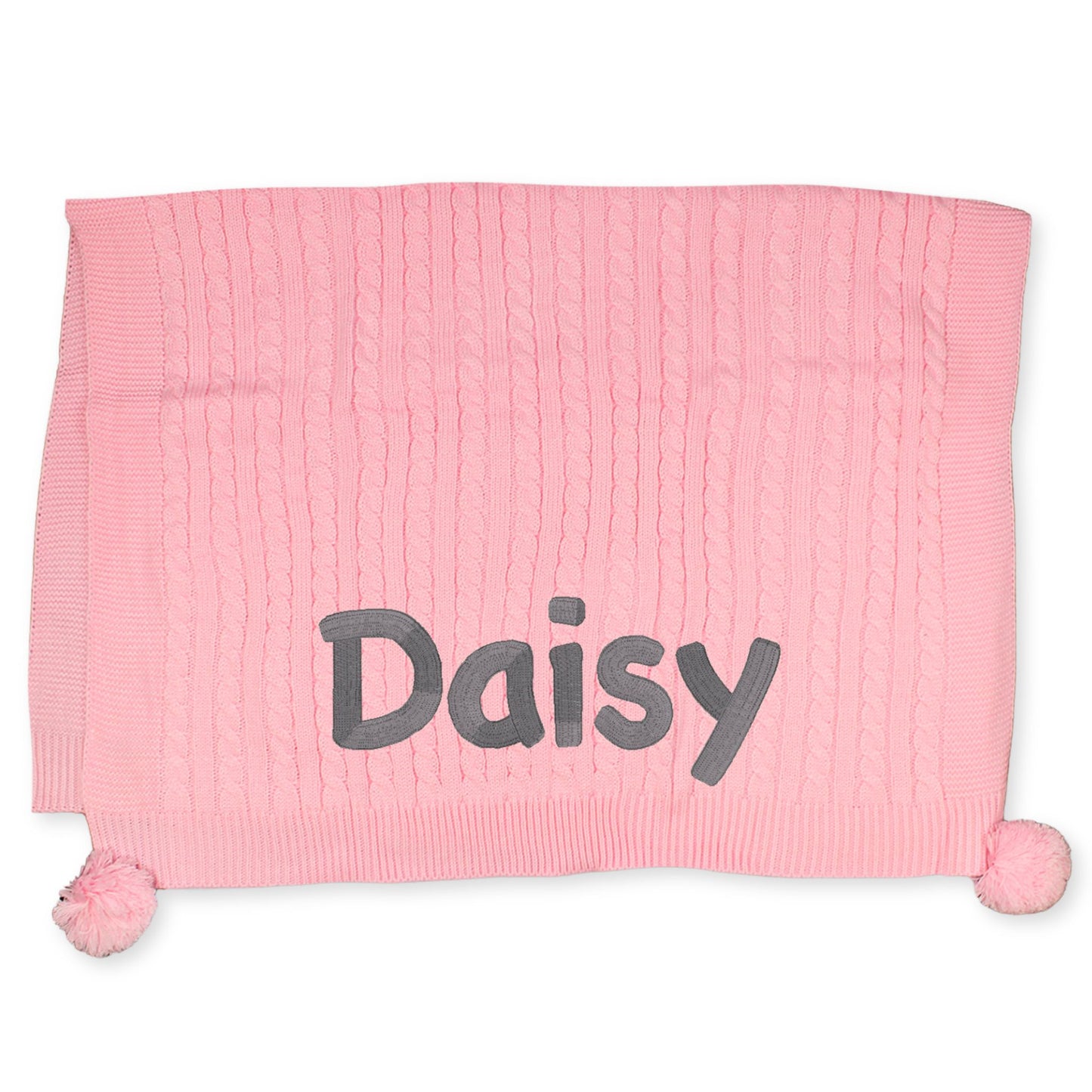 knitted baby girls blanket with pom poms