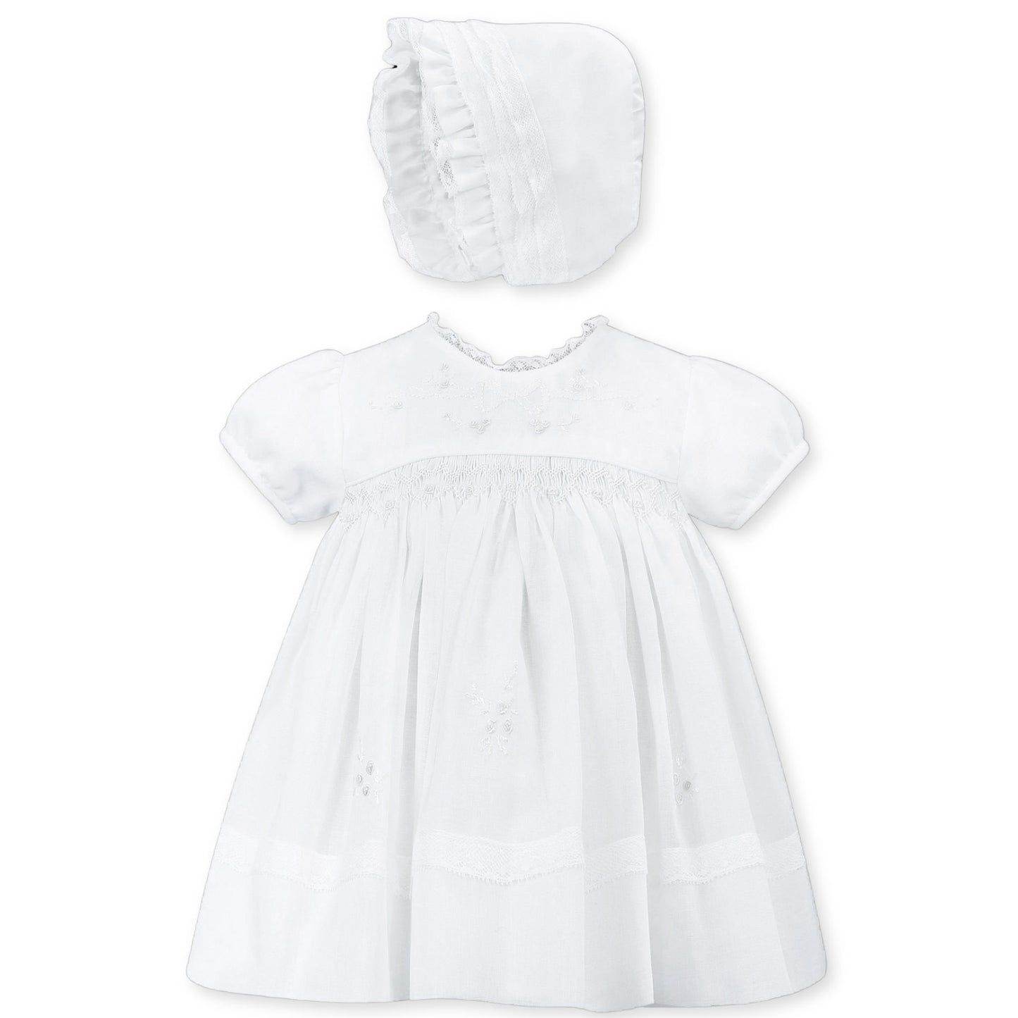 baby girls christening dress with smocking and bonnet in white