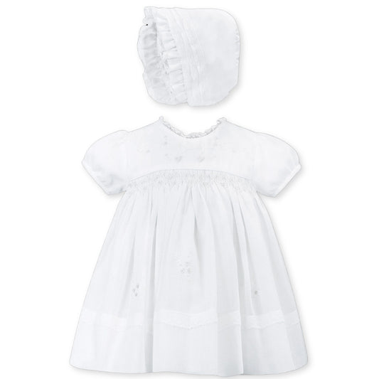 baby girls christening dress with smocking and bonnet in white