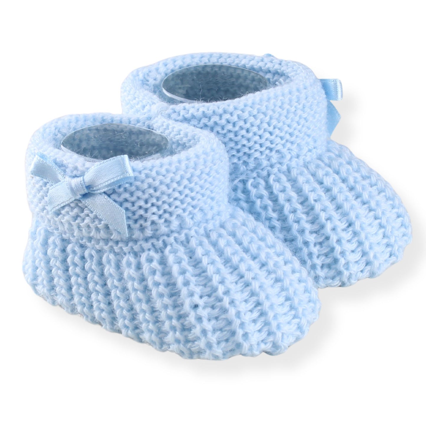 Pair of blue knitted baby booties with a bow on a white background