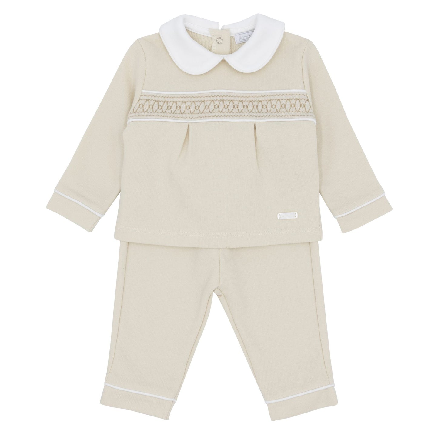 Beige baby outfit with white collar and trim on a white background
