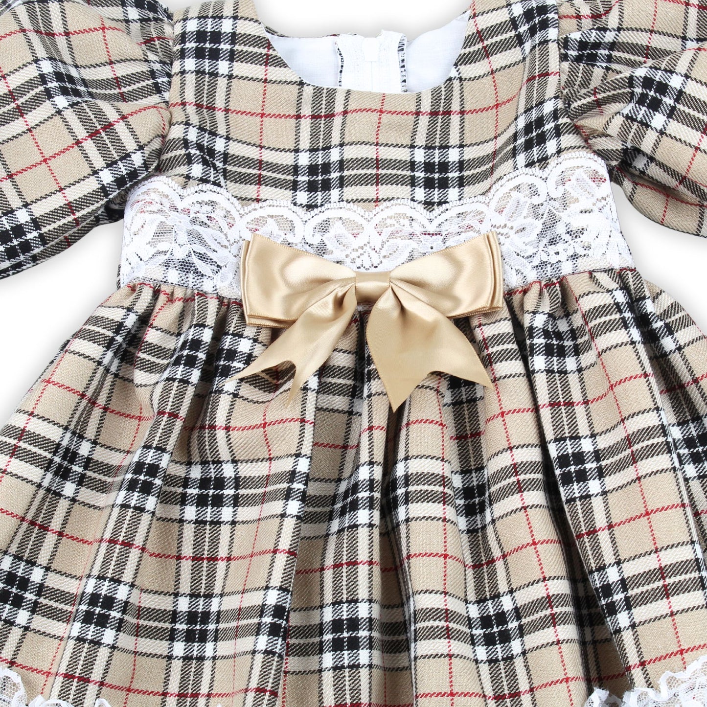 Plaid dress with lace and bow detail on a white background
