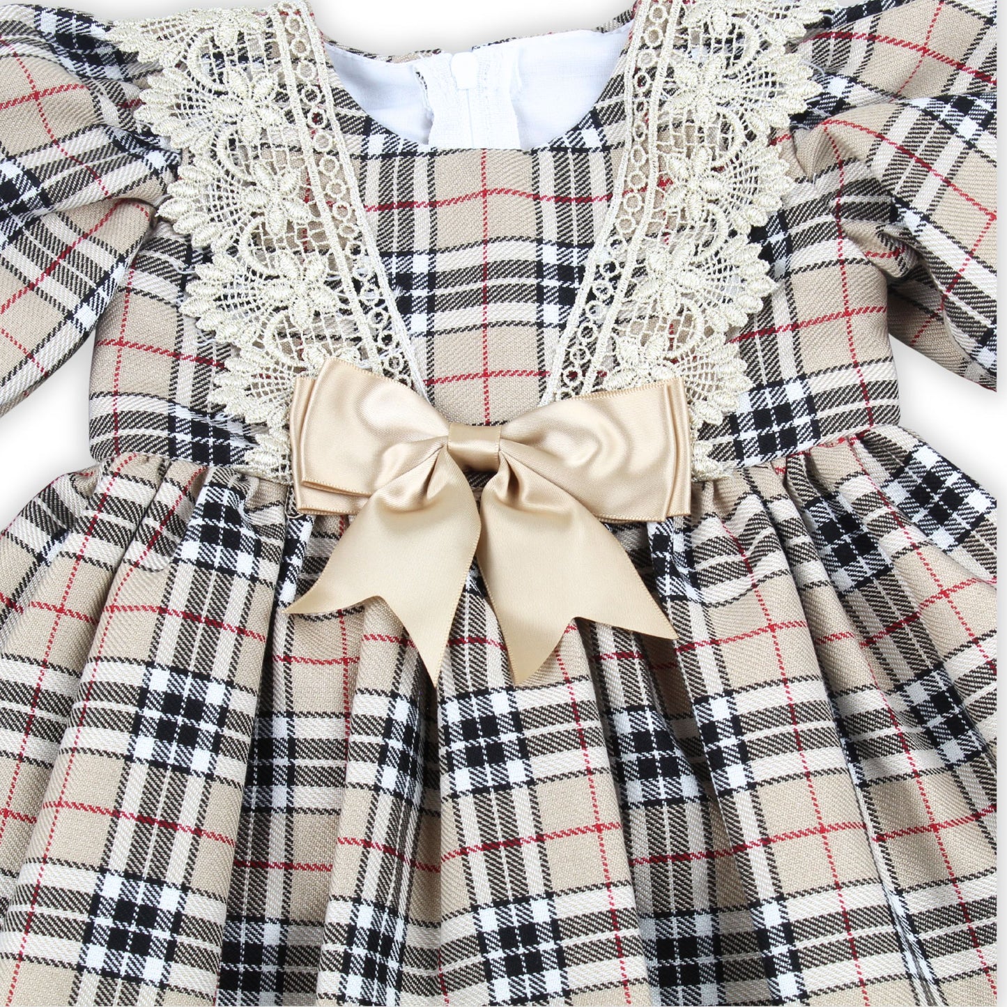 Plaid dress with lace details and a bow on a white background