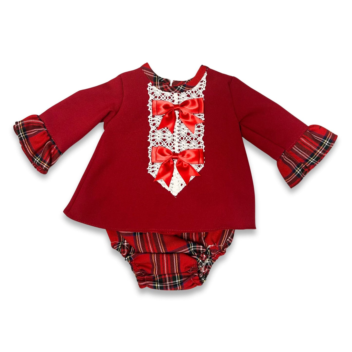 Red baby outfit with plaid details on a white background
