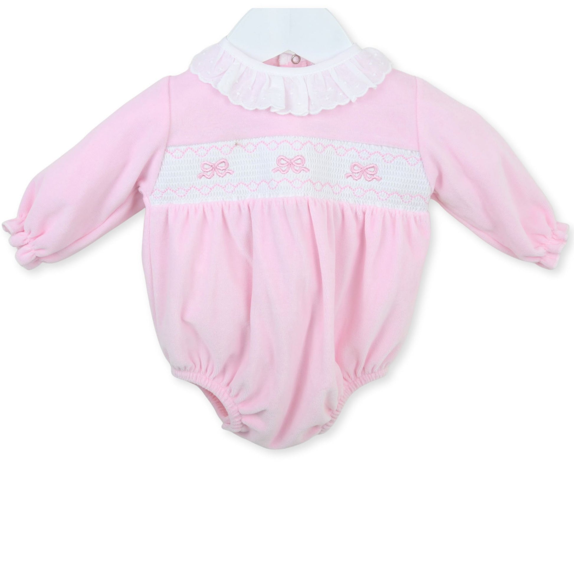 Pink baby romper with white collar and bow details