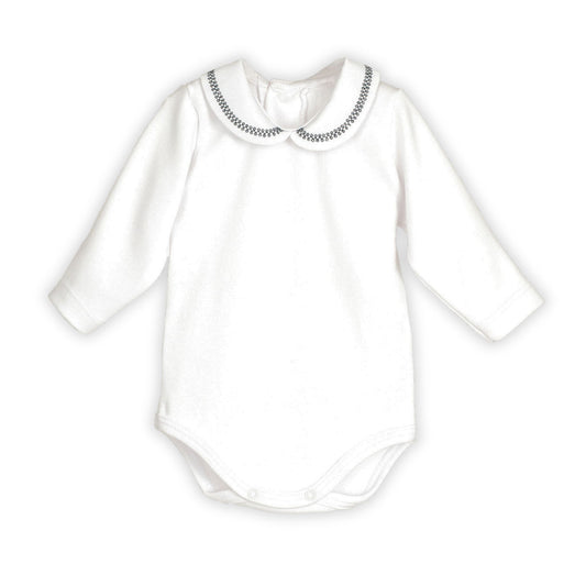 White baby bodysuit with long sleeves and decorative collar on a white background