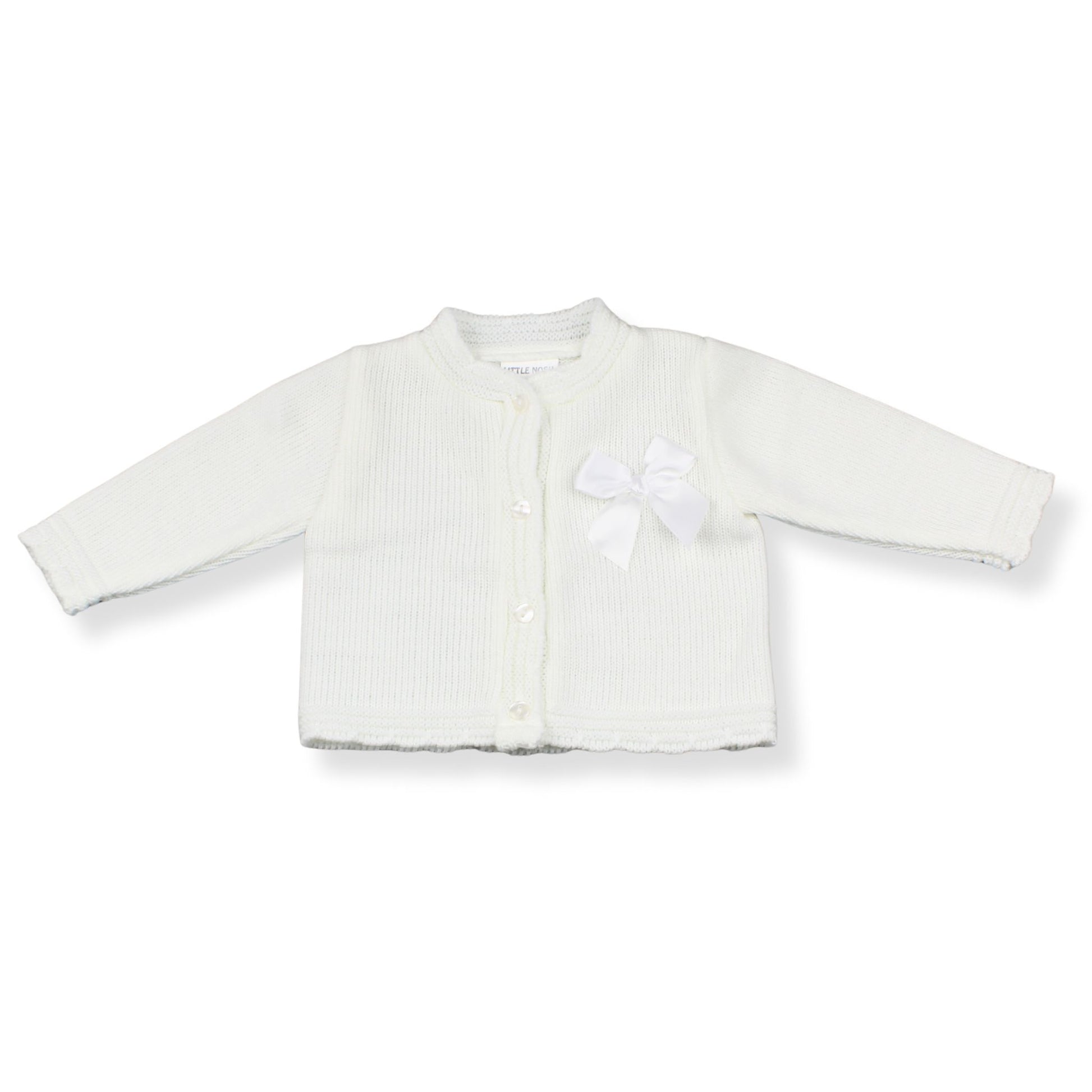 White baby cardigan with a bow on a white background
