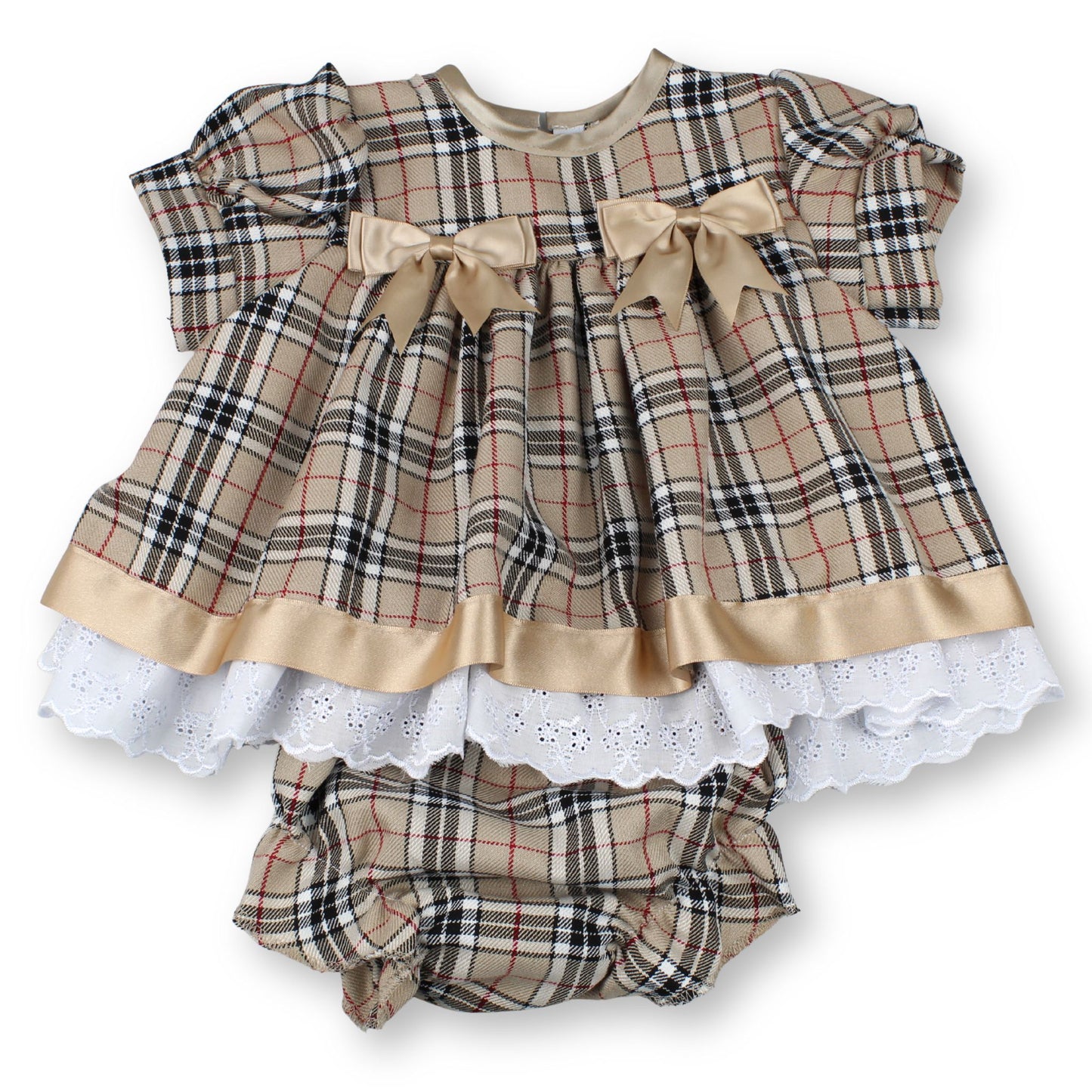 Plaid baby dress with ruffles and bow on a white background