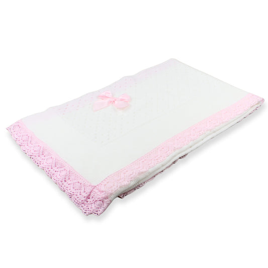 White blanket with pink trim on a white background