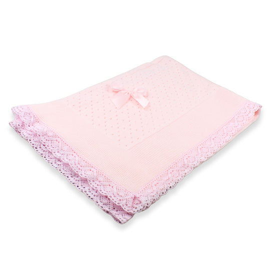 Pink blanket with a bow on a white background