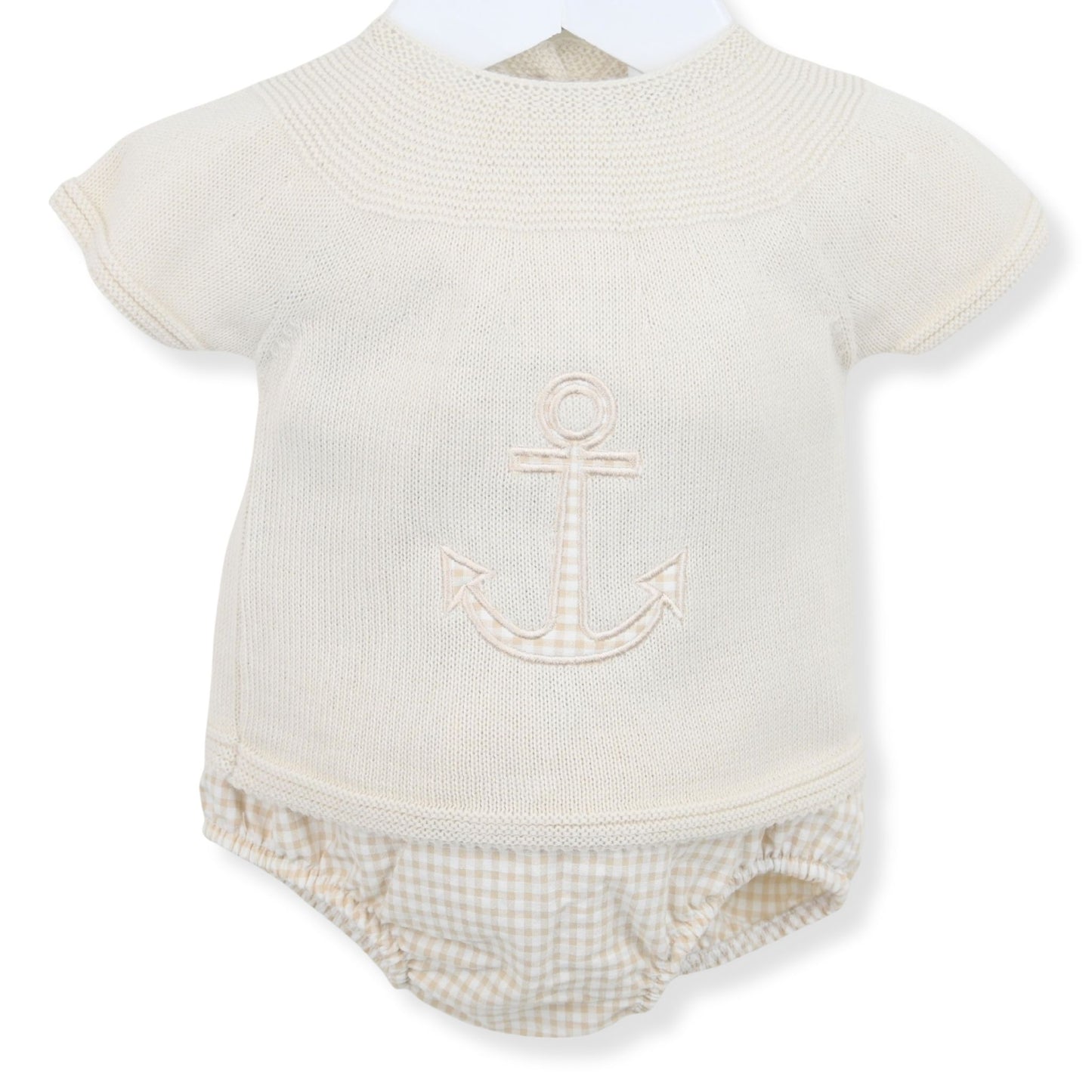 Baby romper with anchor design on a white background