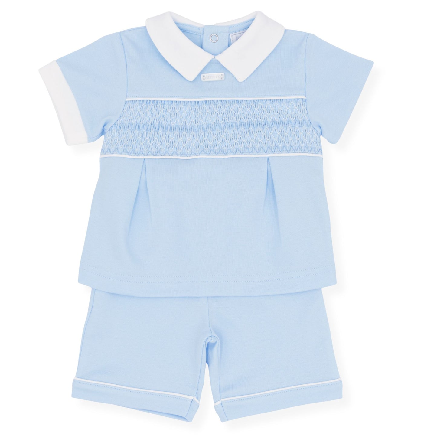 Light blue children's outfit with white collar on a white background