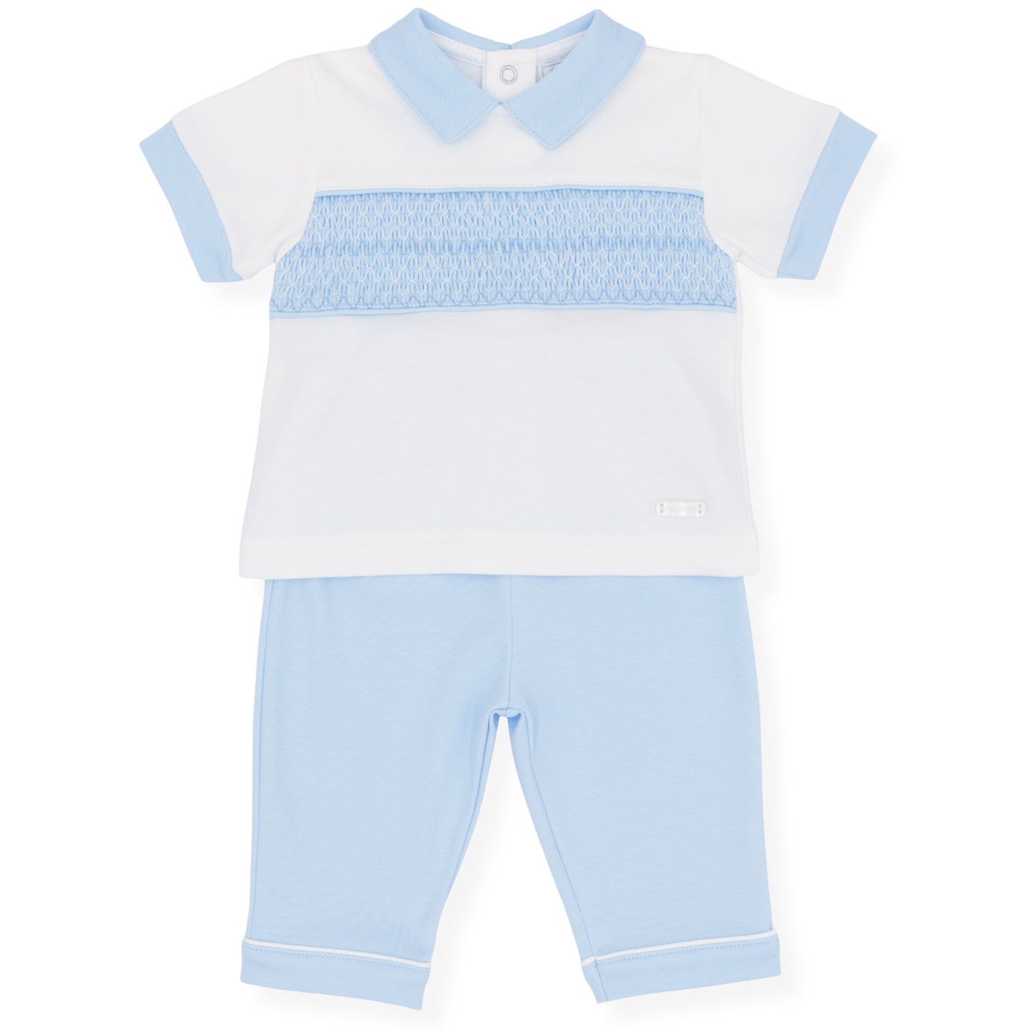 Children's outfit with white shirt and light blue pants on a white background