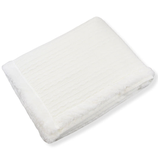 White knitted blanket on a white background