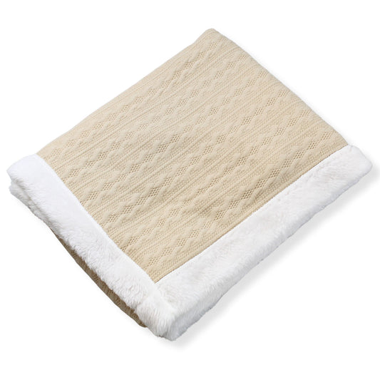 Beige blanket with white trim on a white background