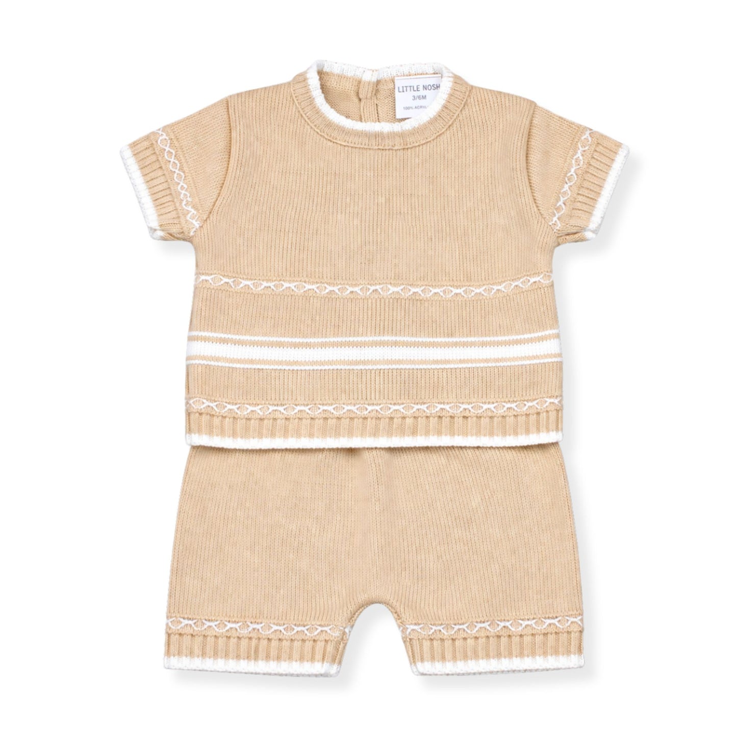 Beige baby romper with white trim on a white background