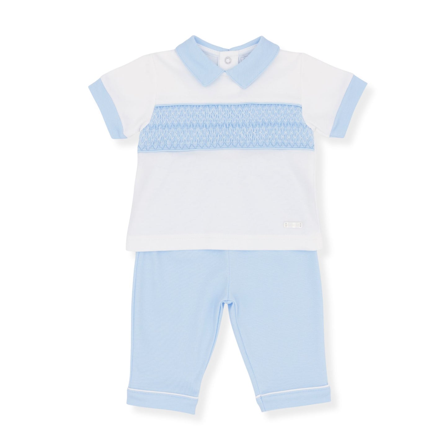 Children's outfit with white shirt and light blue pants on a white background
