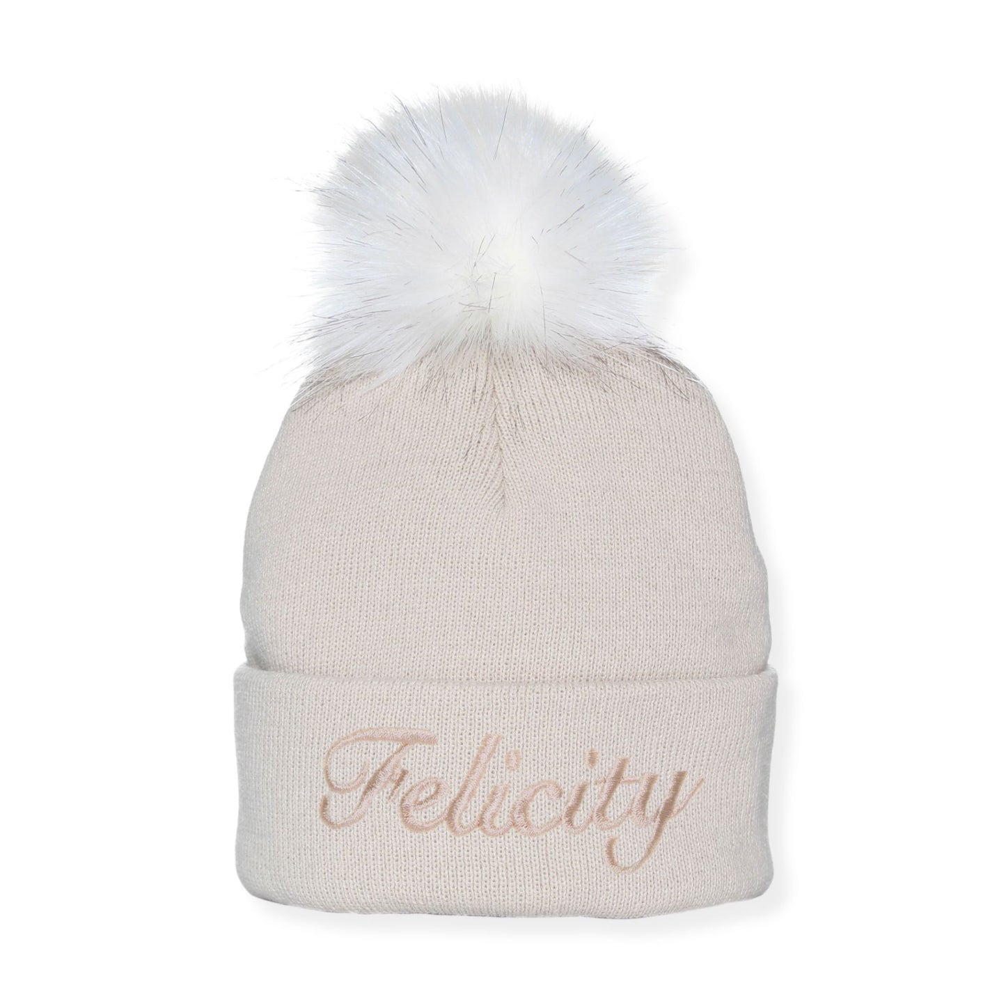Beige beanie with white fur pom-pom and 'Felicity' embroidery on a white background