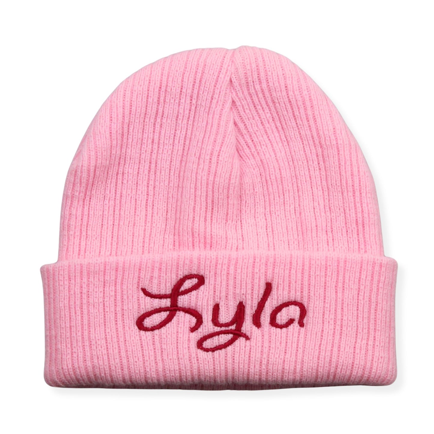 Pink beanie with 'Lyla' embroidered on a white background