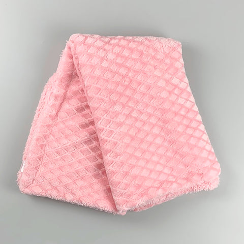 pink baby blanket with diamond design