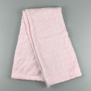 pink baby blanket with spiral design