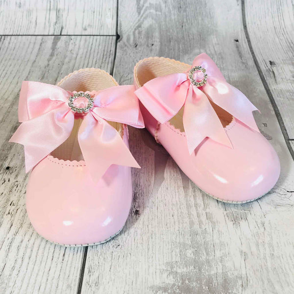 baby girl pink crib shoes with satin bow
