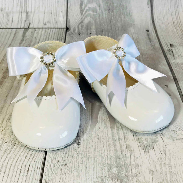 girls white pram shoes with bow