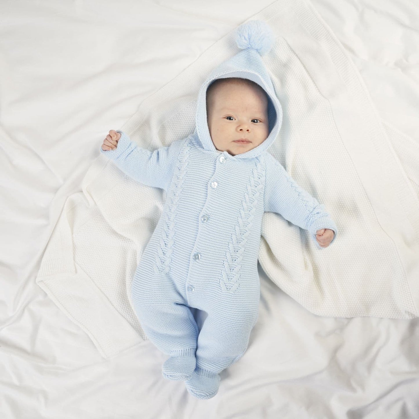 baby boys all in one blue knitted outfit