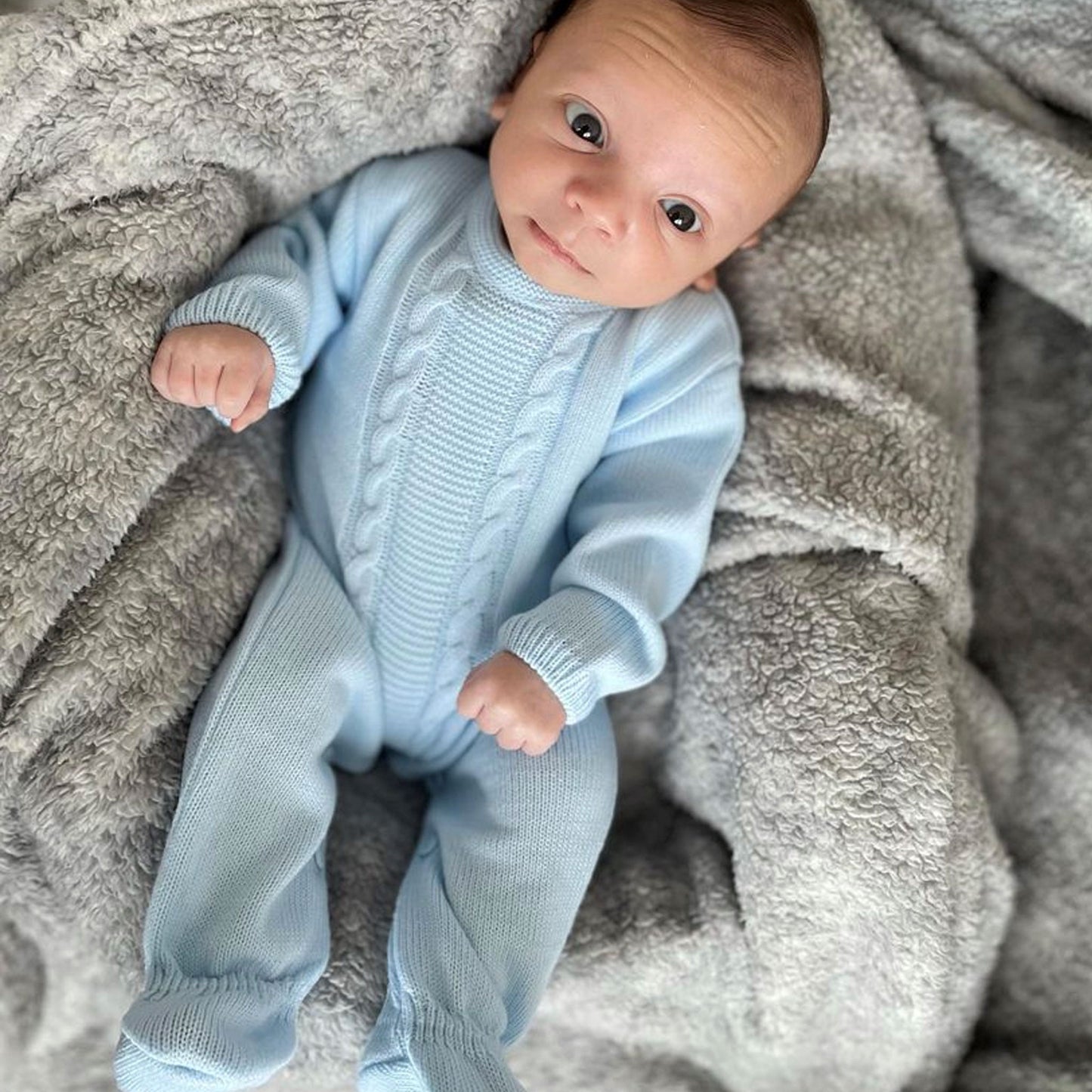 baby boys blue all in one knitted