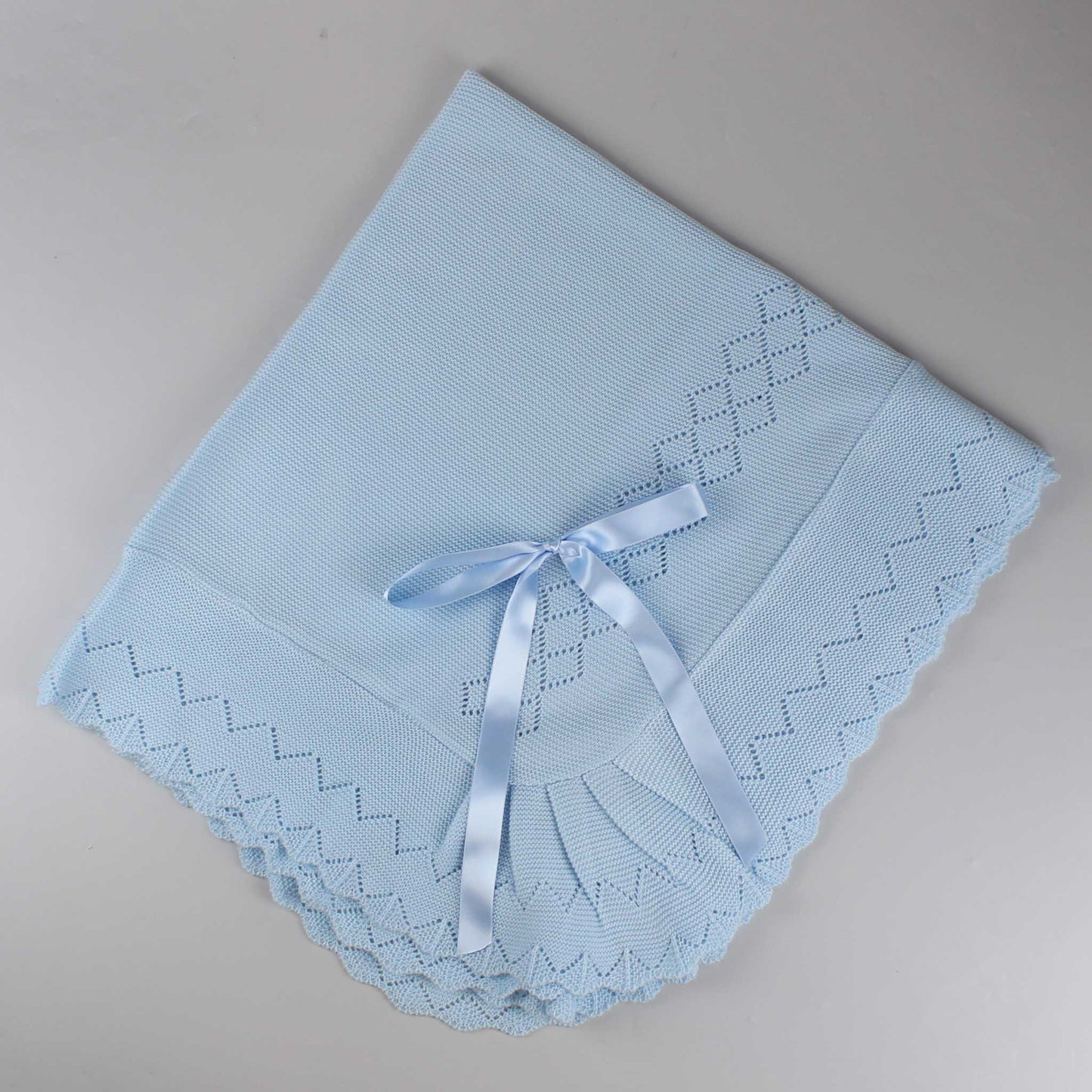 blue knitted shawl