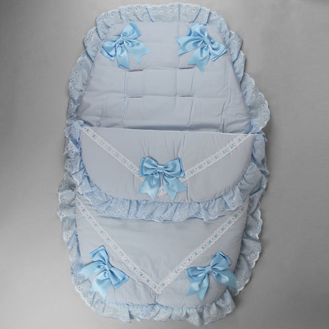 Baby's foot muff with blue bows and ribbon