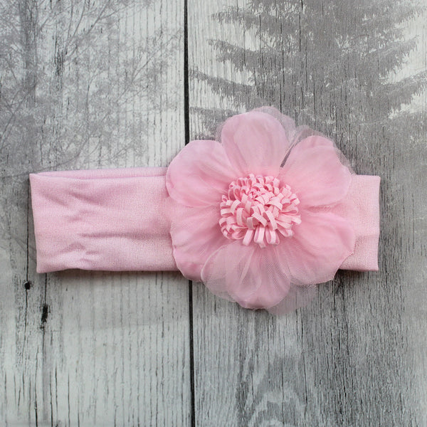 baby girls pink headband with a large flower