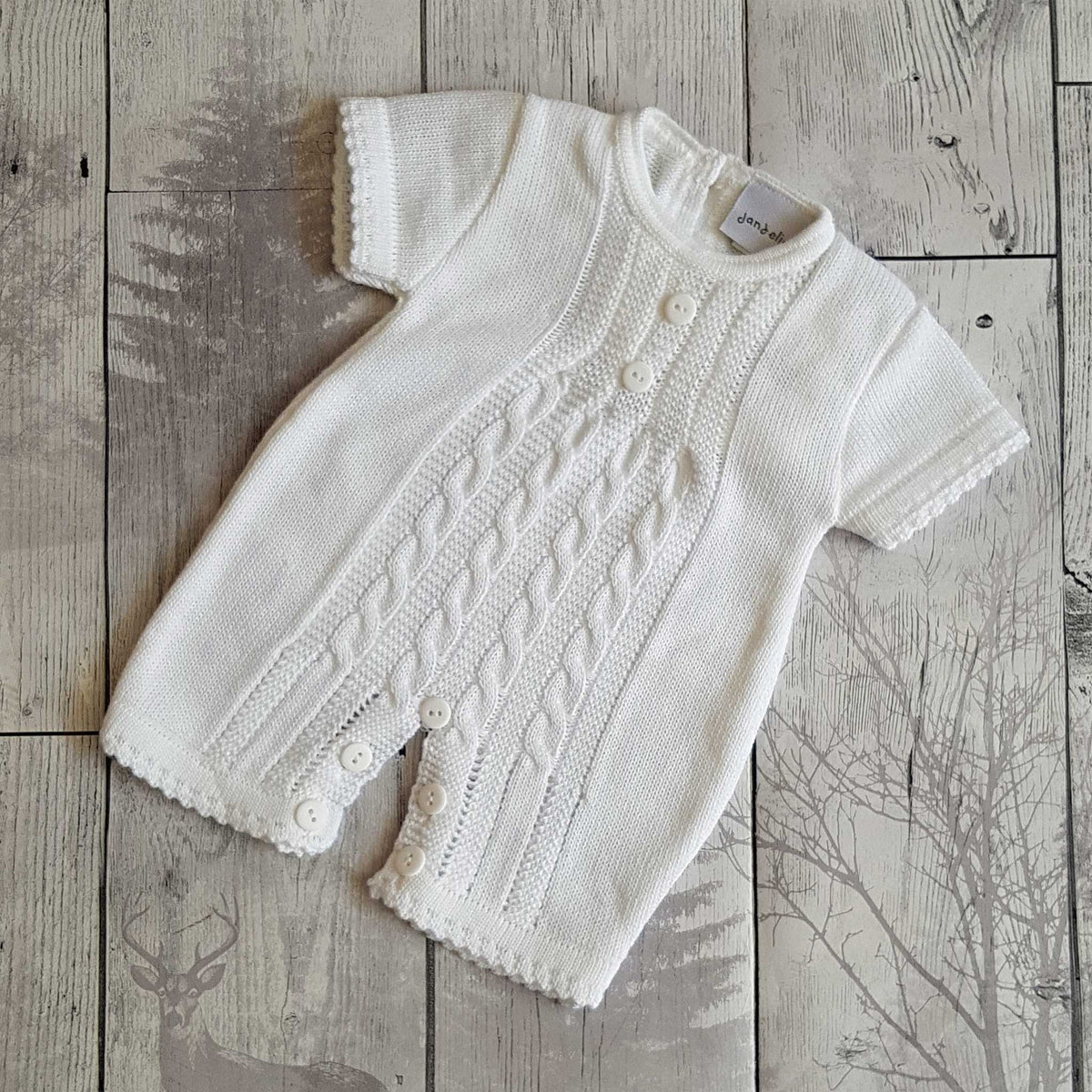 White knitted best sale romper baby