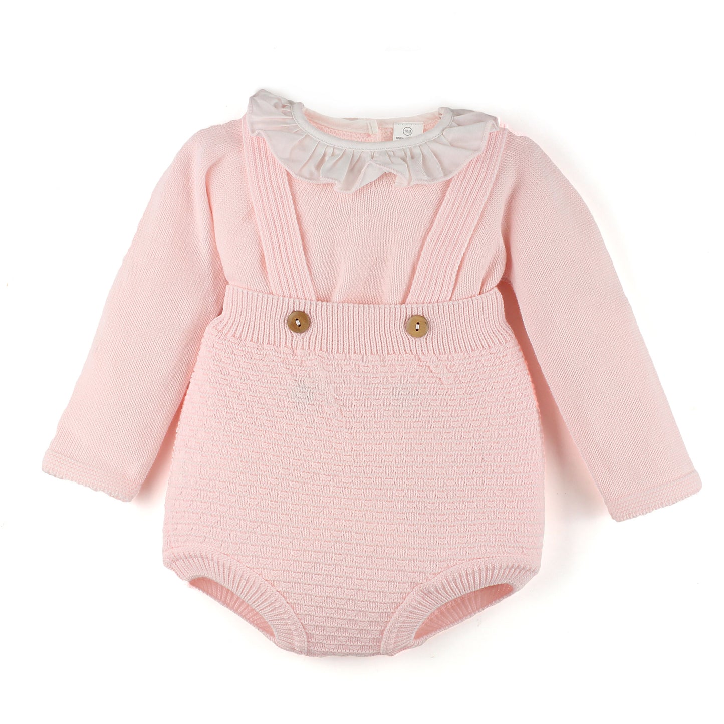 Pink baby romper with long sleeves on a white background