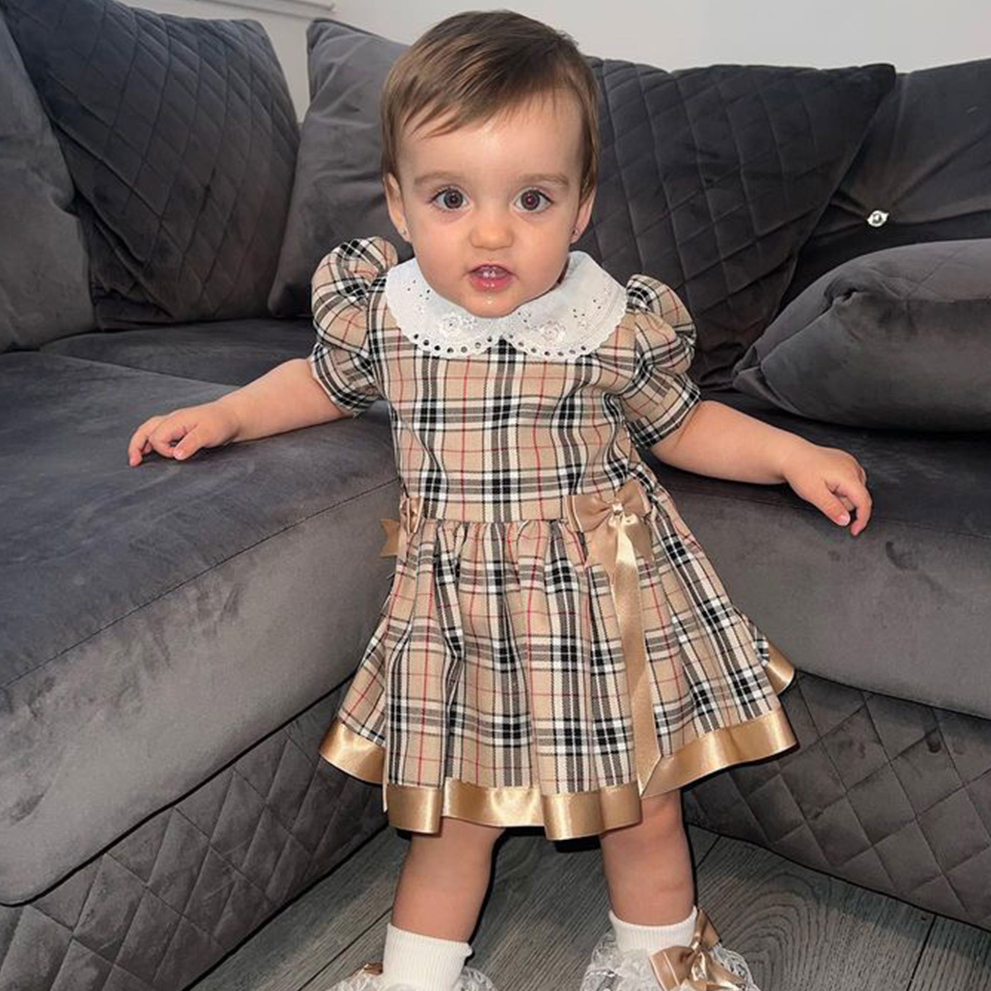 Beige Tartan Dress with Gold Bows | Handmade in the UK Lullaby Lane Baby Shop Beige Tartan Dress with Gold Bows | Handmade in the UK Lullaby Lane Baby Shop