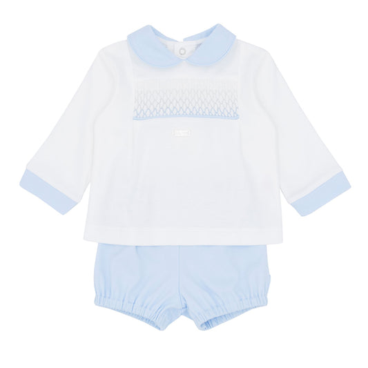 Baby outfit with white shirt and light blue shorts on a white background