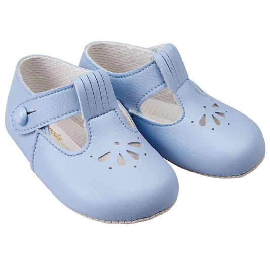 Pair of light blue baby shoes with cut-out design on a white background