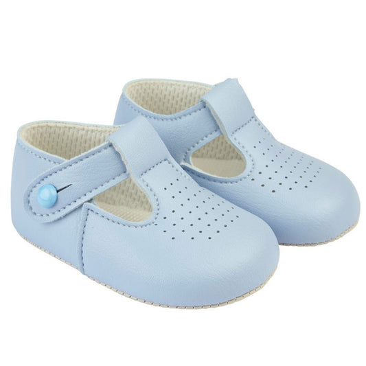 Pair of light blue baby shoes with a strap on a white background