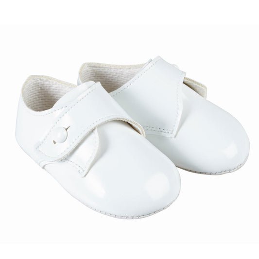 pair of baby white shoes

