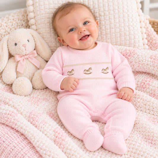 baby girl pink knitted all in one 