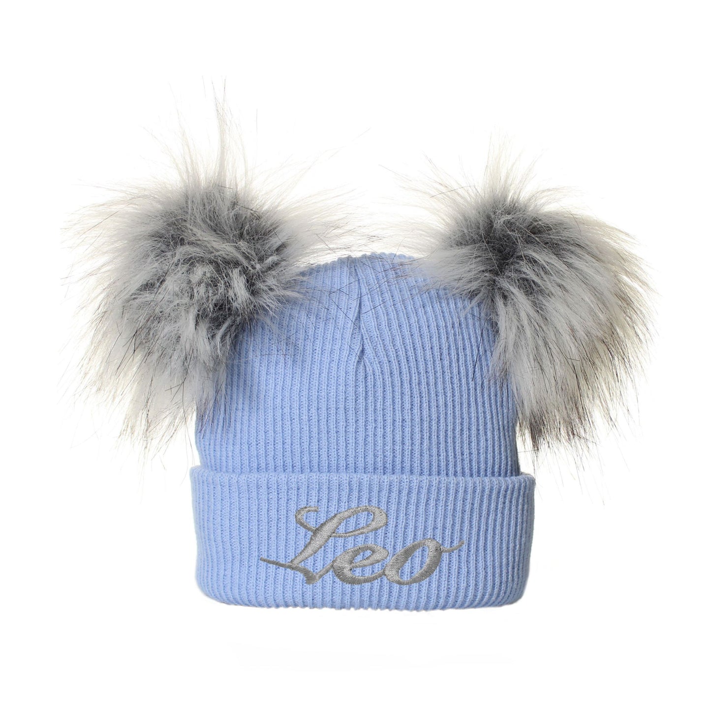 Light blue beanie with fur pom-poms and 'Leo' embroidery on a white background