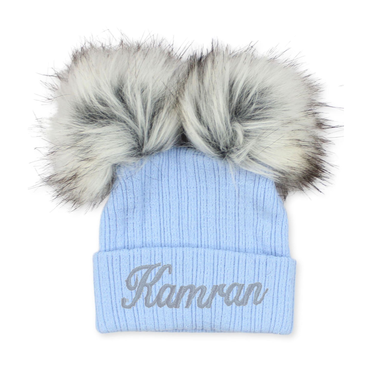 Light blue beanie with fur pom-pom on a white background