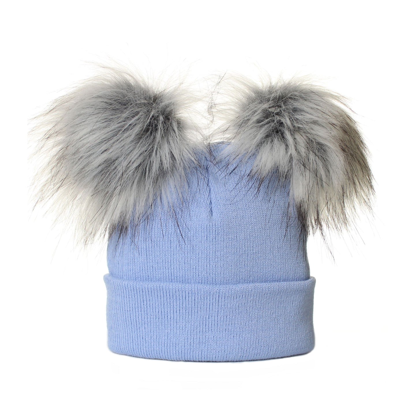 Light blue knit beanie with large fur pom-poms on a white background