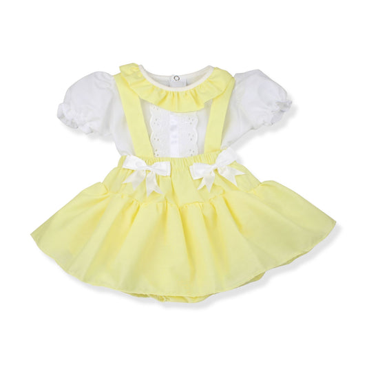 Yellow dress with white ruffled sleeves on a white background
