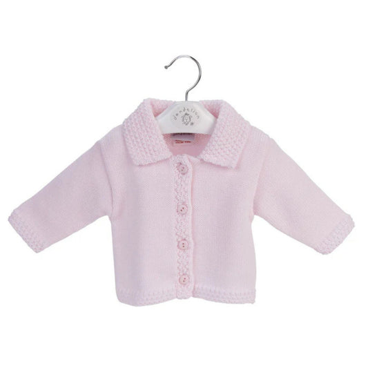 Pink baby jacket on a hanger against a white background