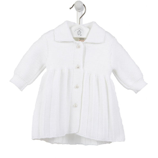 White baby coat on a hanger against a white background