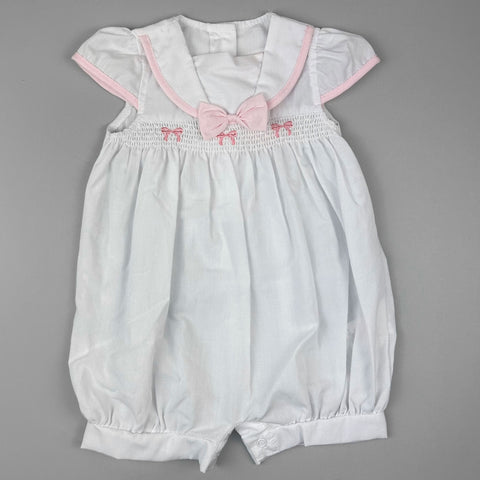 baby girls white andpink romper
