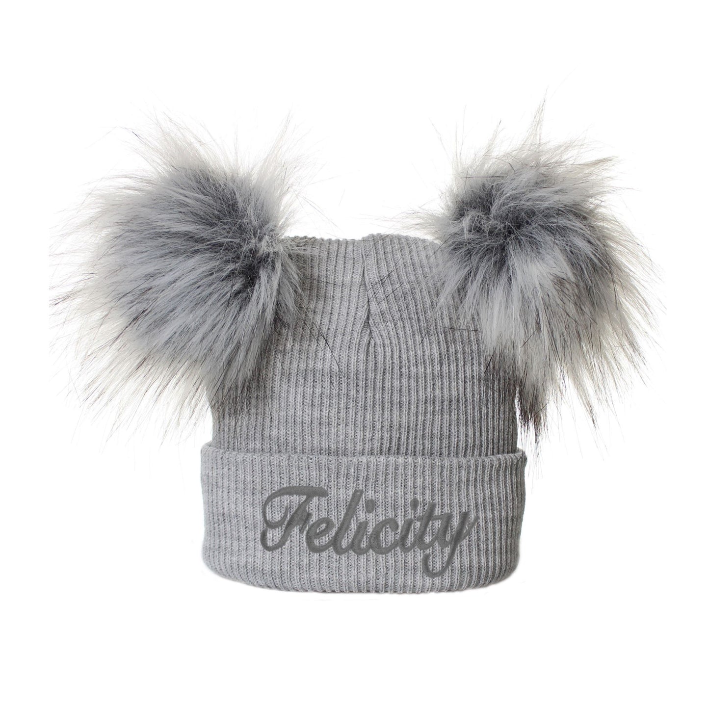 Gray knit beanie with two large fur pom-poms on a white background